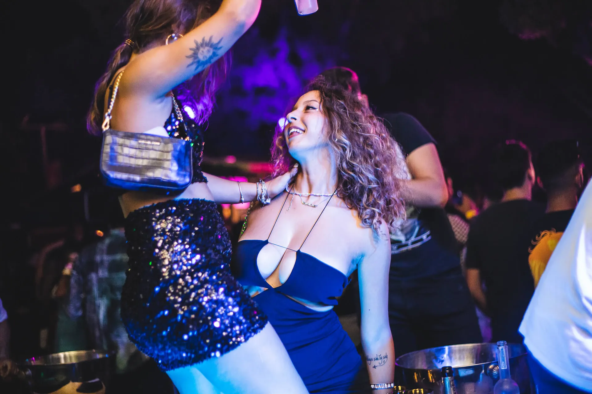 Two friends dancing together at Move it! Malta