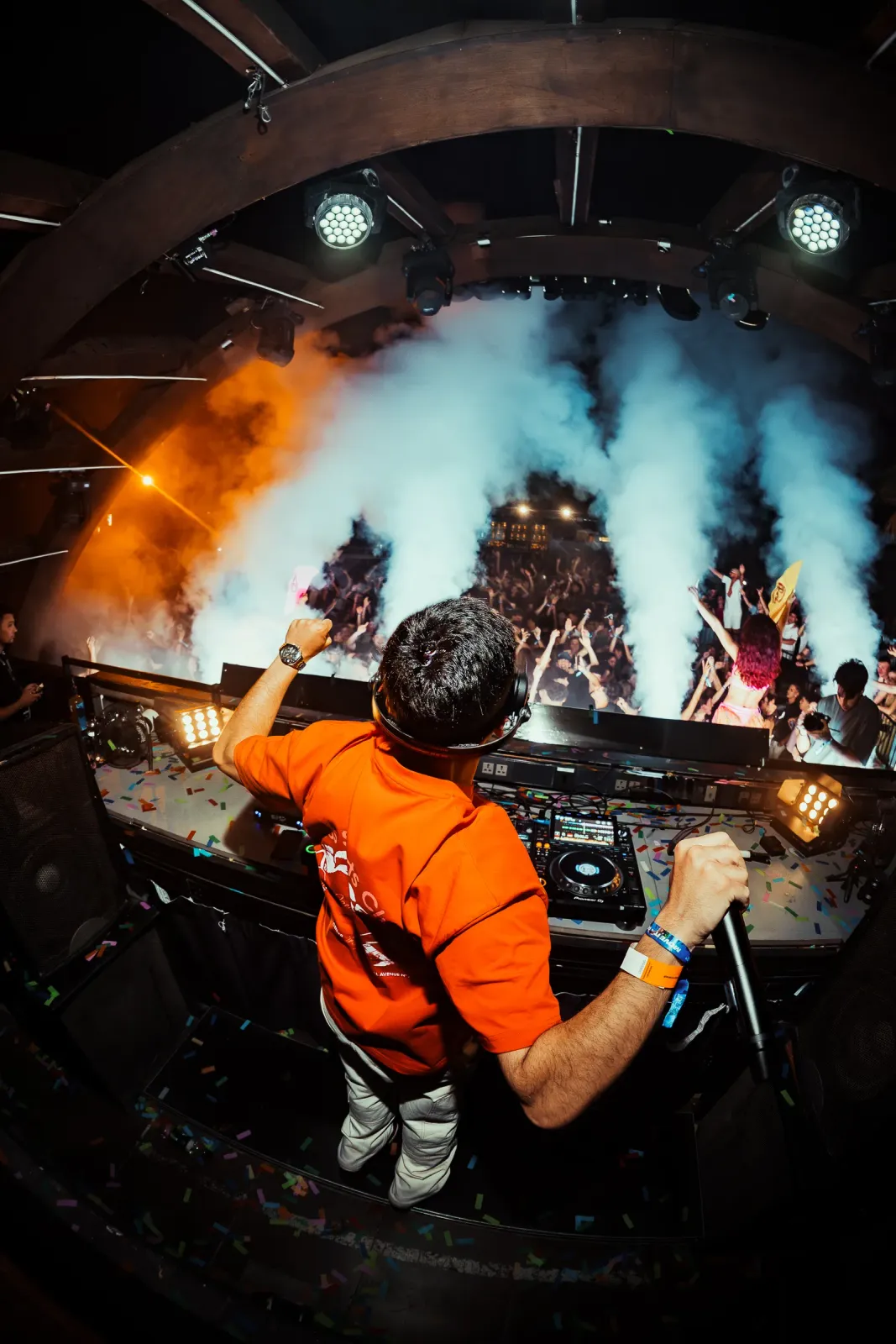 DJ in the booth at Move it! Malta with smoke and lights over the stage